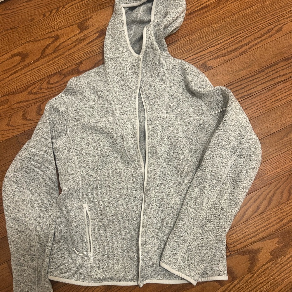 Tna action zip up